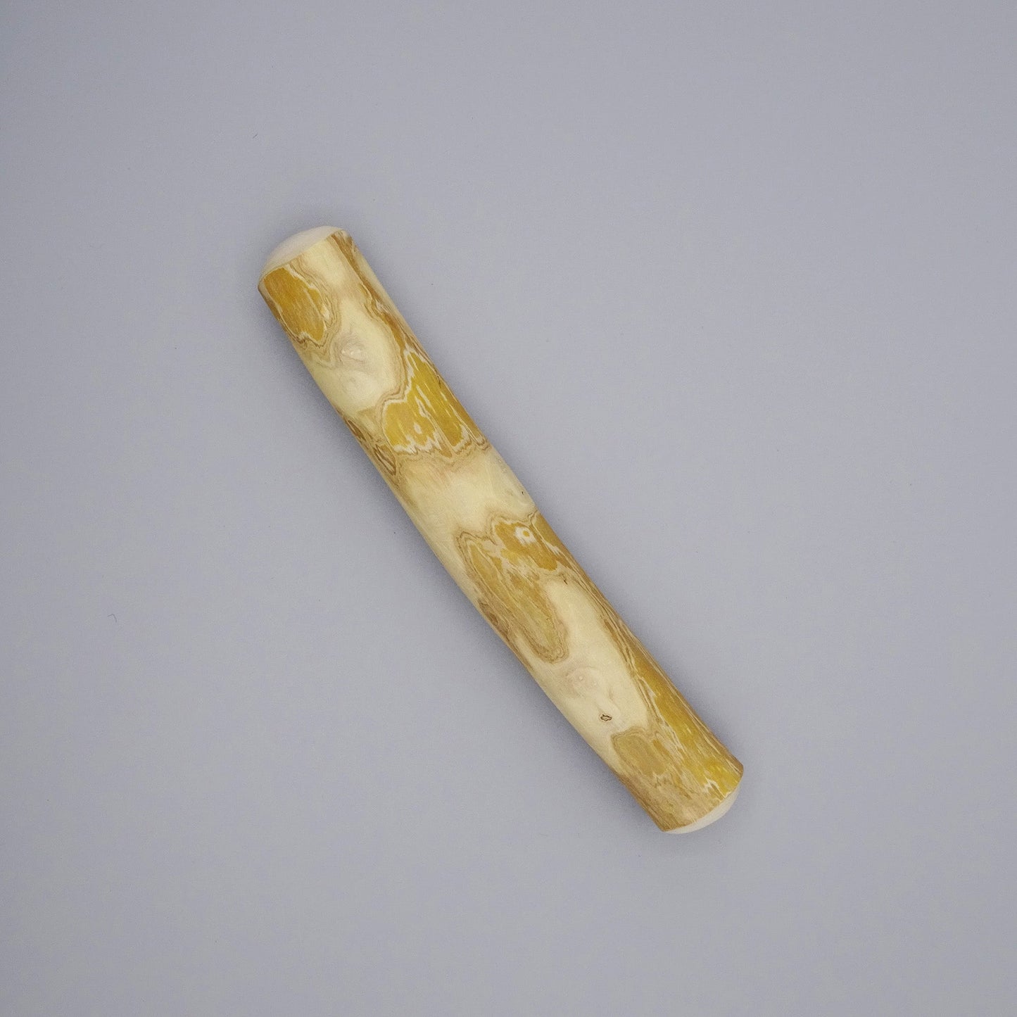 Medium coffee wood sticks with natural grain on a gray background 