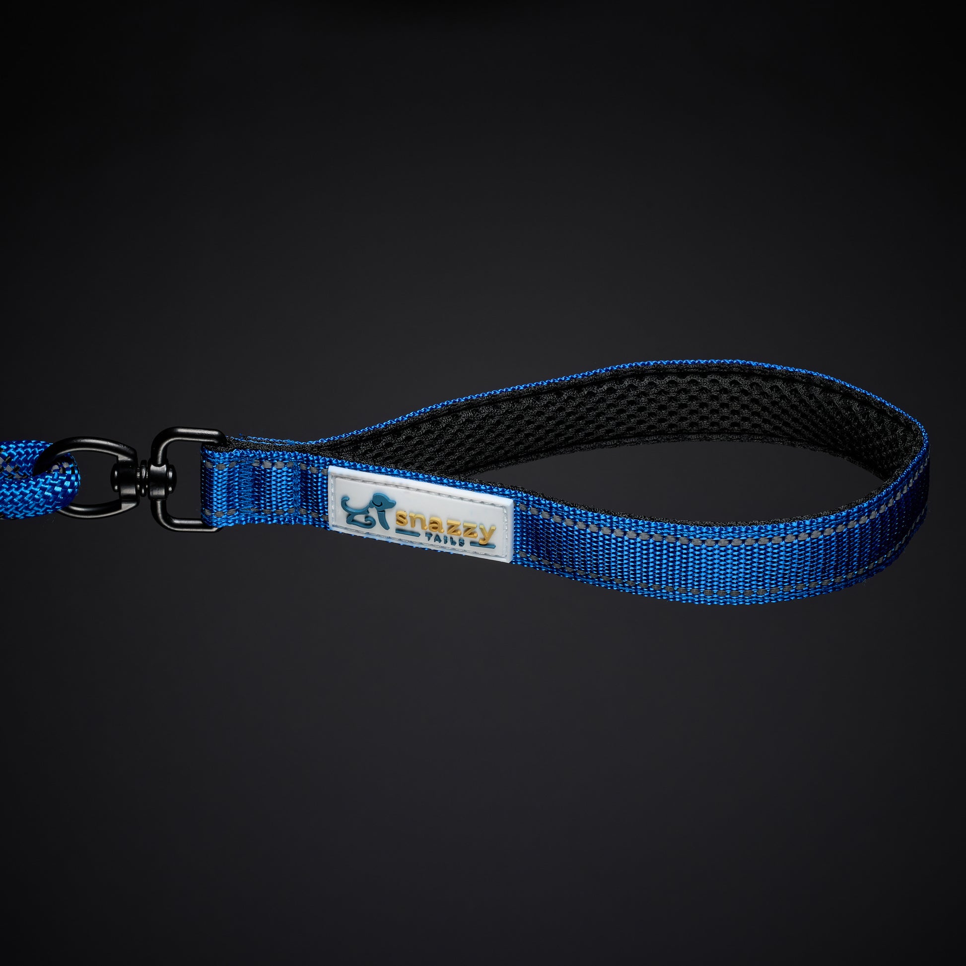 Blue dog leash with a brand label on a black background