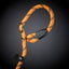 Orange climbing rope with black accents on a dark background