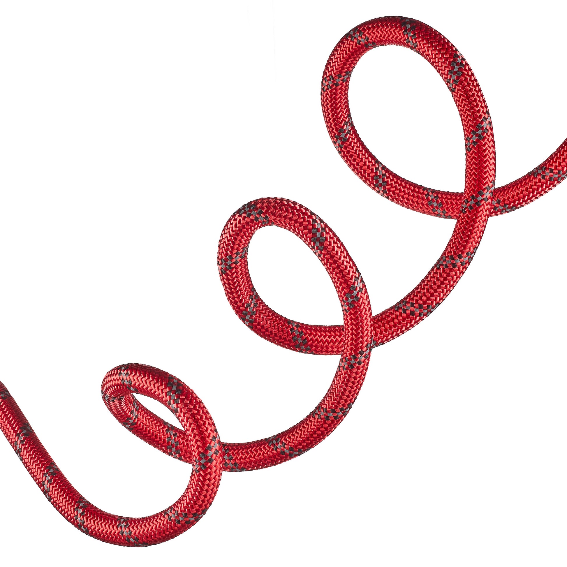 Red rope with black pattern coiled on a white background
